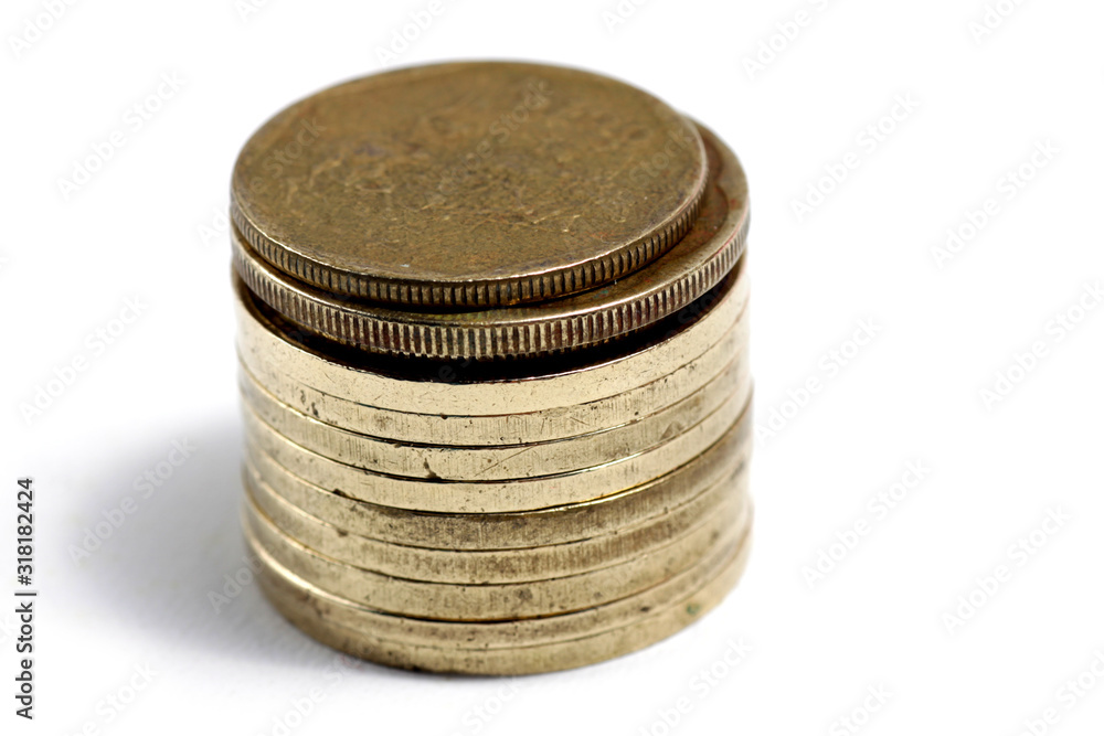 Close up shot of stacked golden coin isolated Close up shot of stacked golden coin isolated