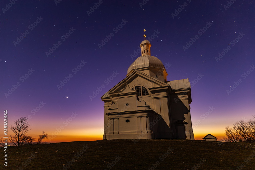 Holy Hill (Svaty Kopecek) with Saint Sebastian chapel at night. Mikulov, South Moravian region. Czech Republic. Holy Hill (Svaty Kopecek) with Saint Sebastian chapel at night. Mikulov, South Moravian region. Czech Republic.