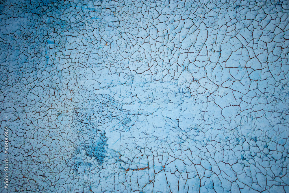 Old peeling paint on concrete wall of a house Old peeling paint on concrete wall of a house