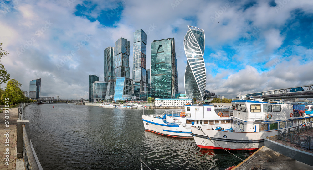 Panorama of river ships and Moscow City - International Business Center, view from the embankment of the Moskva-river