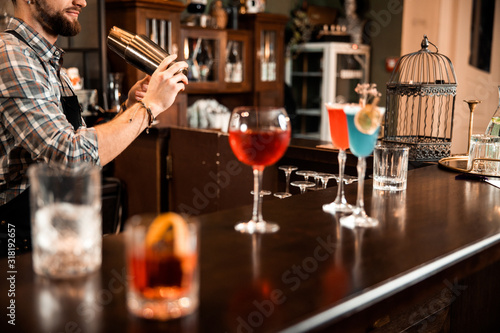 Bartender is mixing a summer cocktail