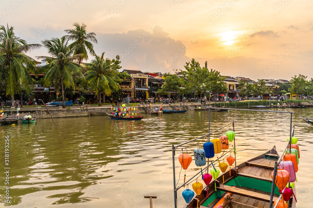 Landscape with wooden boats and Thu Bon River in Hoi An , Vietnam
