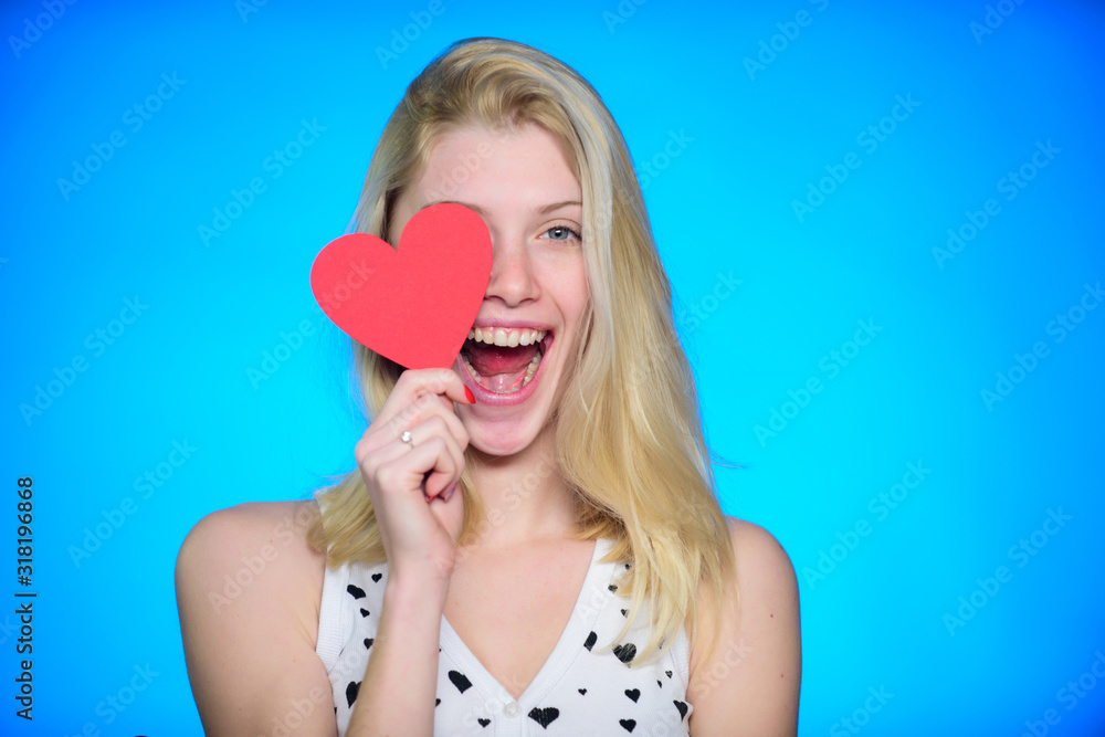 Moments of joy. woman with decorative heart. Date. Love and romance. Romantic greeting. Valentines day sales. happy woman on blue background. Valentines day party Moments of joy. woman with decorative heart. Date. Love and romance. Romantic greeting. Valentines day sales. happy woman on blue background. Valentines day party