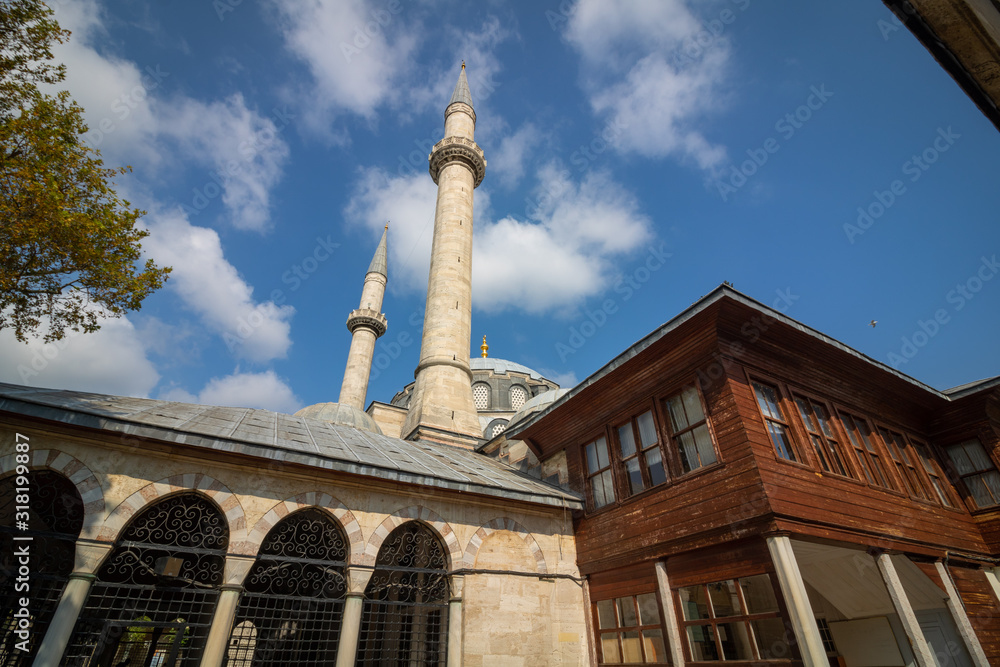 Valide Atik Mosque and a wooden house, which is built by Mimar Sinan, in Istanbul