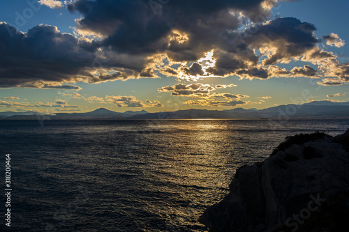 Cape Melagkavi at gulf of Corinth, Greece - Sunset photo