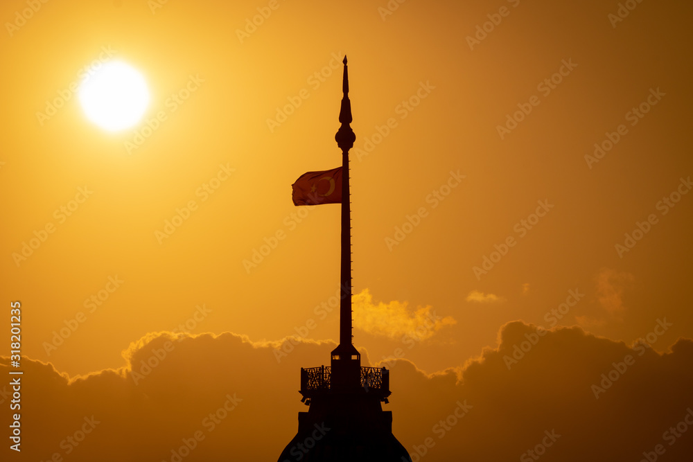 Turkish National Flag on the Maiden's Tower at sunset