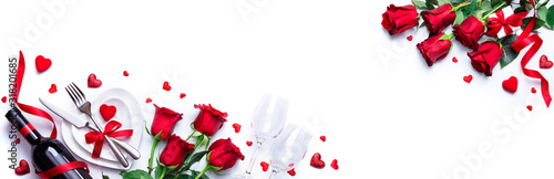 Valentines Day Dinner - White Romantic Table Setting With Wine And Red Roses