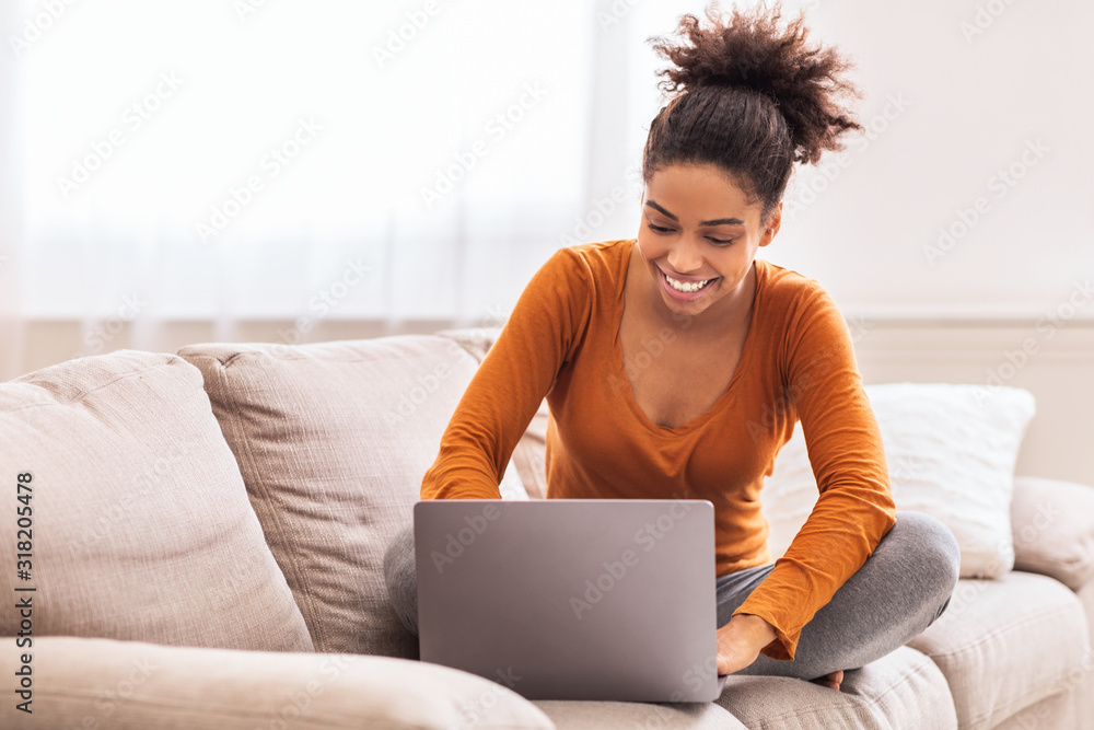 Happy Lady Using Laptop Working From Home Sitting On Sofa Happy Lady Using Laptop Working From Home Sitting On Sofa
