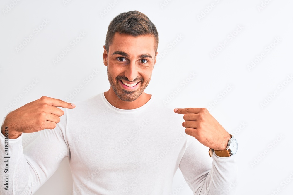 Young handsome man wearing white shirt over isolated background looking confident with smile on face, pointing oneself with fingers proud and happy. Young handsome man wearing white shirt over isolated background looking confident with smile on face, pointing oneself with fingers proud and happy.
