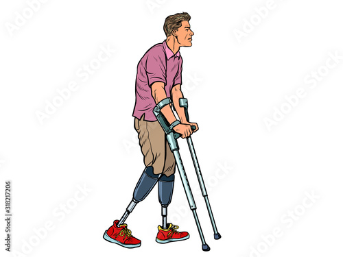 legless veteran with a bionic prosthesis with crutches. a disabled man learns to walk after an injury. rehabilitation treatment and recovery