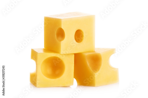 Close-up of cheese cubes, isolated on white