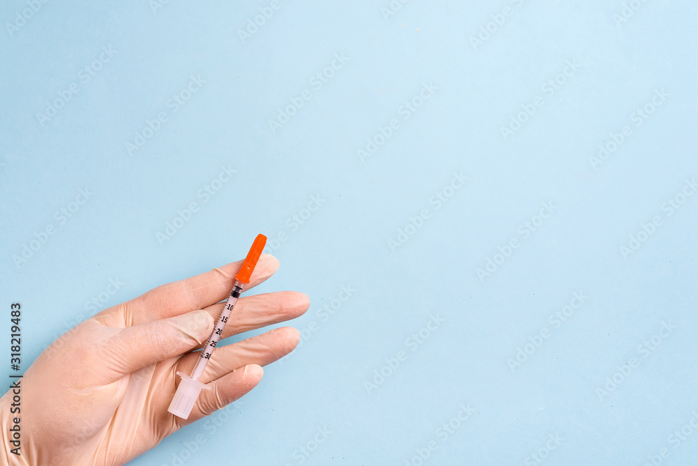 Syringe for medical research in the hands of a doctor, Concept Disease Virus, Coronavirus Syringe for medical research in the hands of a doctor, Concept Disease Virus, Coronavirus