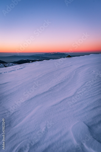 Winter sunrise from Rila mountain national park, Scary lake region, Bulgaria
