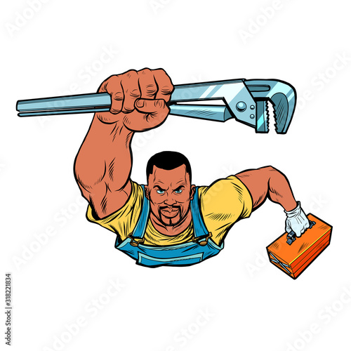 African repairman with an adjustable wrench