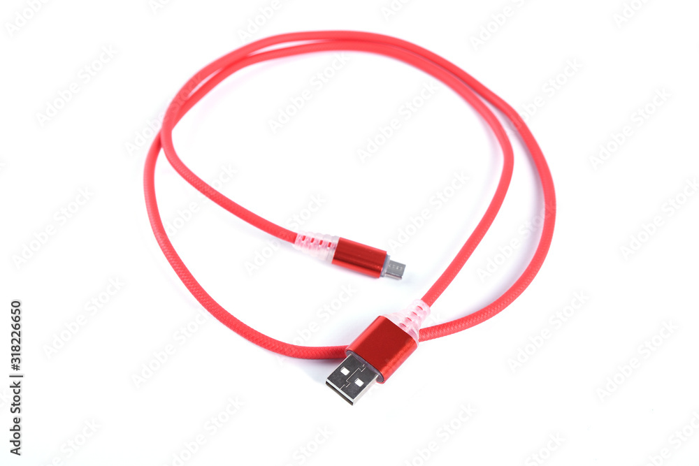 Red USB cable for smartphone charge isolated on white background. Red USB cable for smartphone charge isolated on white background.