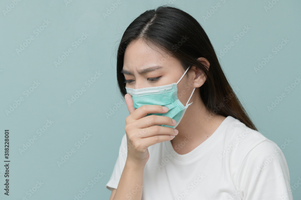 Asian women wearing surgical masks protect against the virus.Corona virus and wear a mask to prevent dust pm 2.5. Asian women wearing surgical masks protect against the virus.Corona virus and wear a mask to prevent dust pm 2.5.