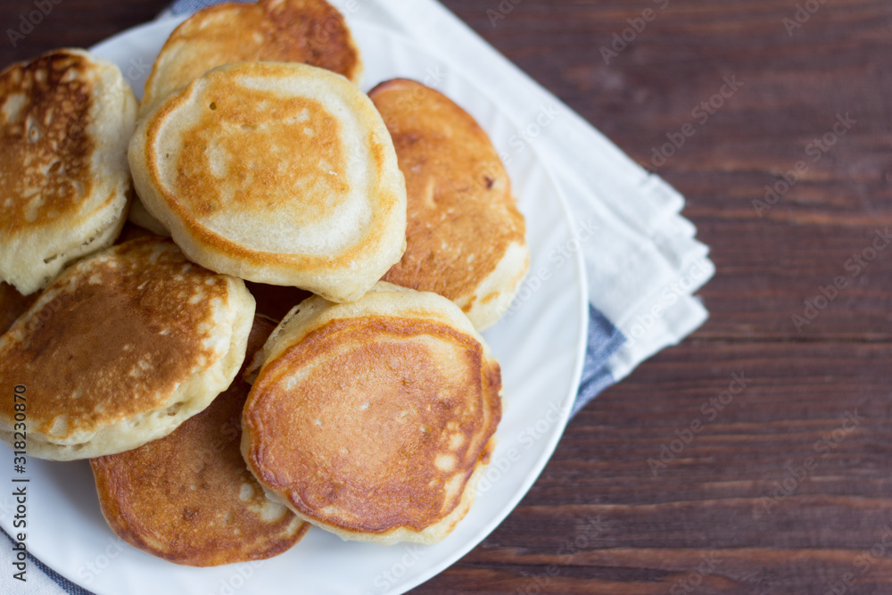 Lush homemade pancakes for Breakfast on the table. Lush homemade pancakes for Breakfast on the table.