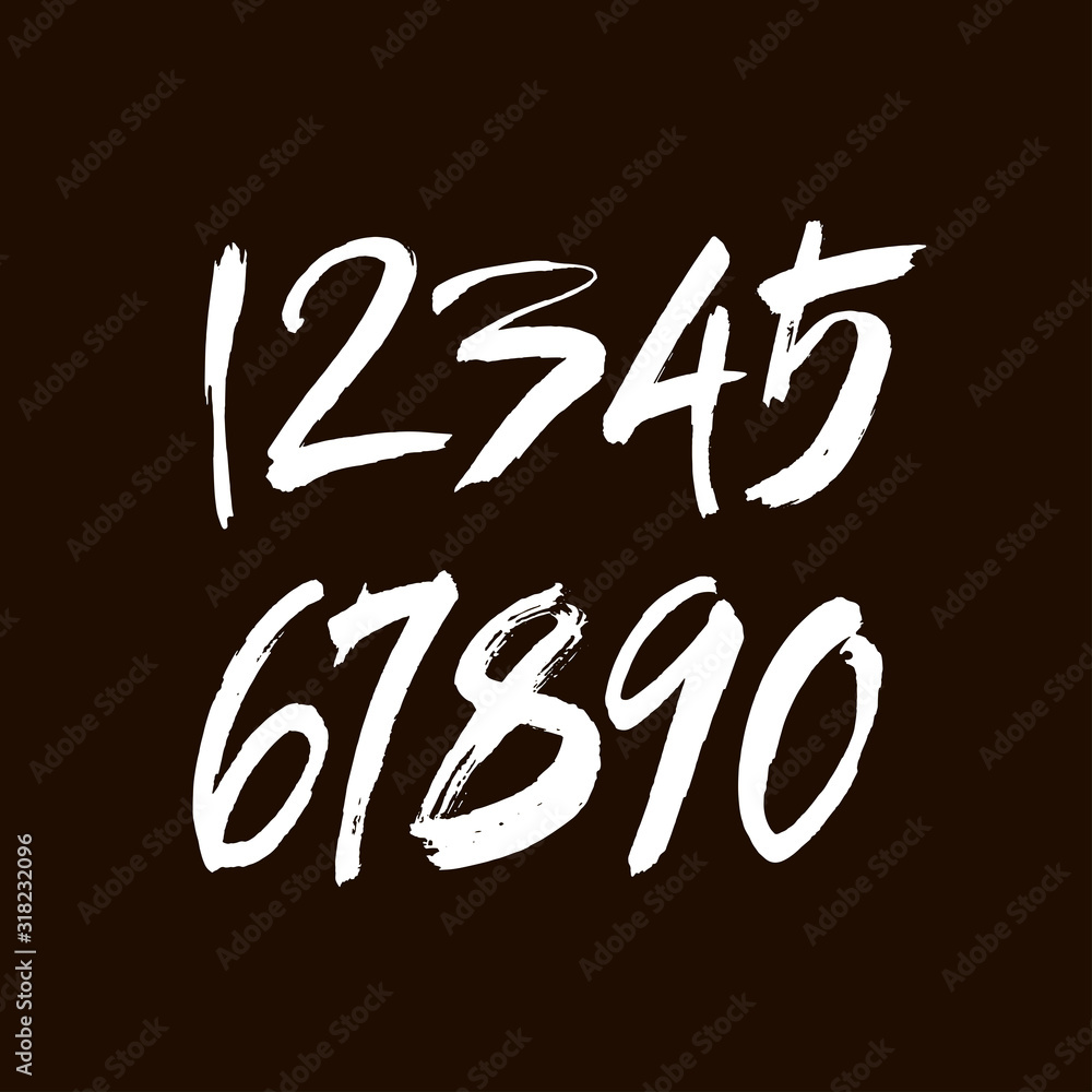 set of calligraphic acrylic or ink numbers. ABC for your design, brush lettering on a black background set of calligraphic acrylic or ink numbers. ABC for your design, brush lettering on a black background