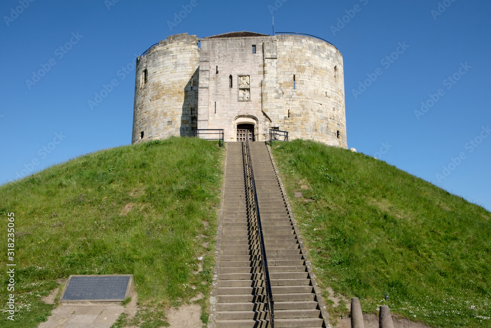 Clifford's Tower, York, Yorkshire, UK. Impressive medieval castle on top op round hill.