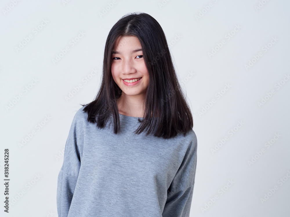 Smiling young woman over white background