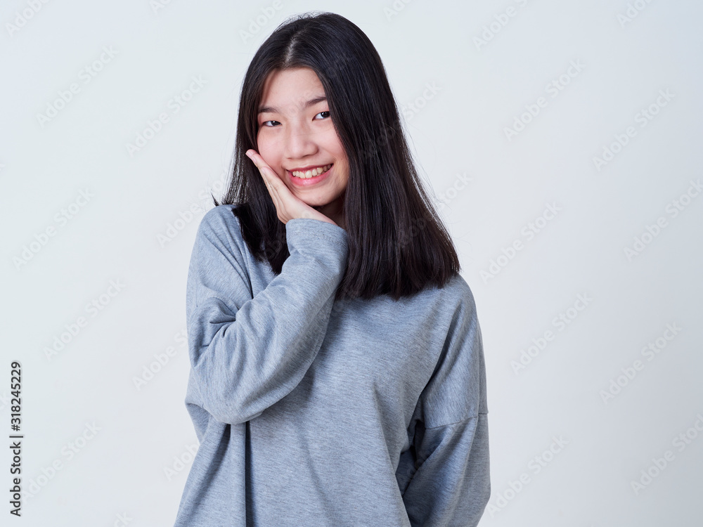 Smiling young woman over white background Smiling young woman over white background