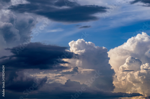 Beautiful stormy cumulus clouds in the sky, background. © andrei310