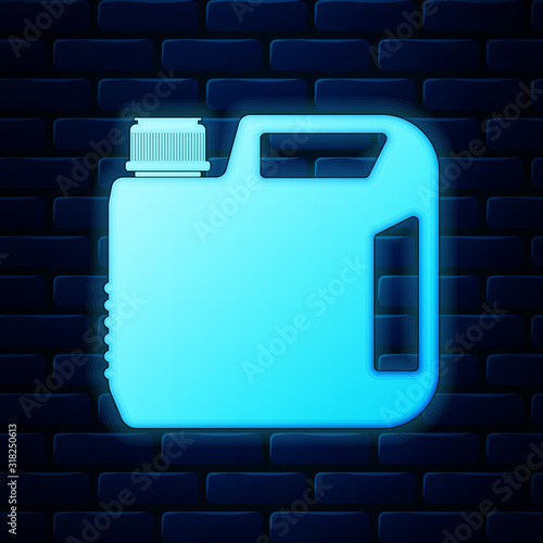 Glowing neon Plastic canister for motor machine oil icon isolated on brick wall background. Oil gallon. Oil change service and repair. Engine oil sign. Vector Illustration