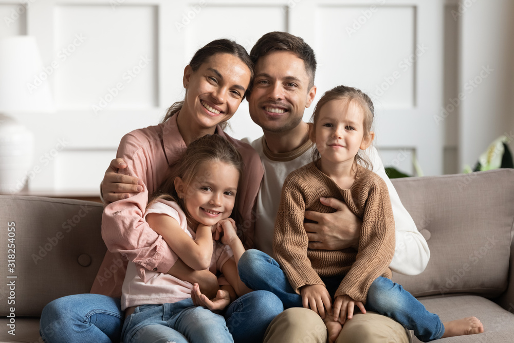 Portrait of loving family with kids posing at home Portrait of loving family with kids posing at home