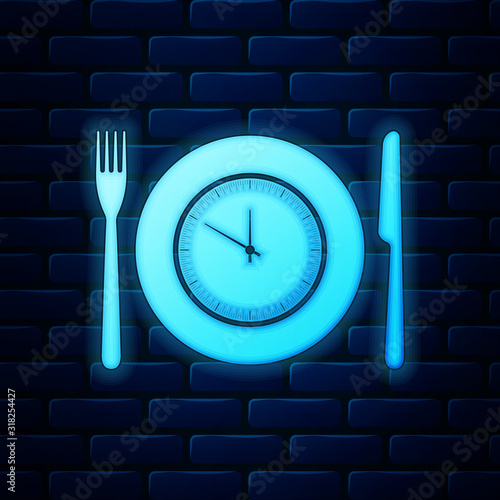 Glowing neon Plate with clock, fork and knife icon isolated on brick wall background. Lunch time. Eating, nutrition regime, meal time and diet concept. Vector Illustration