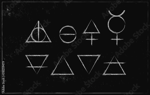 Alchemy symbols isolated on dark background. Magic vector decorative elements