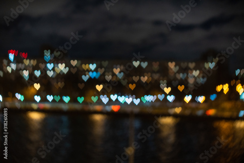 Fototapeta Naklejka Na Ścianę i Meble -  Night heart bokeh background. Valentine's day background
