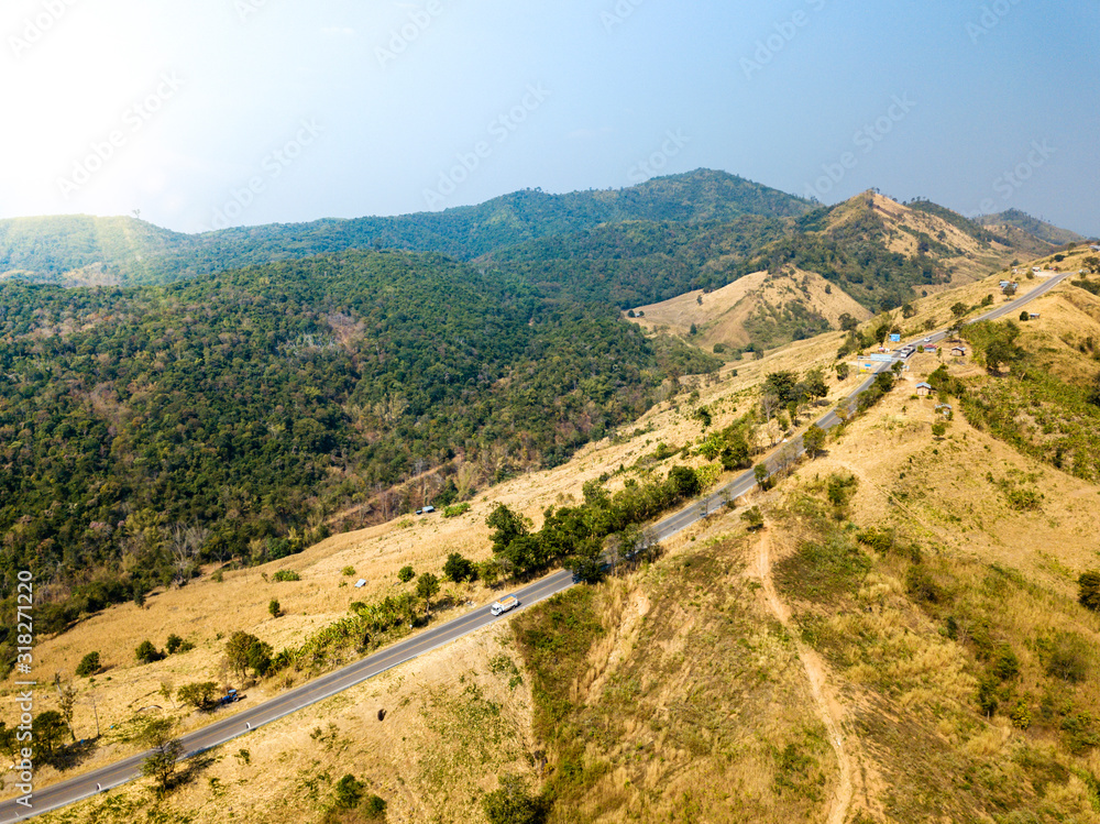 the aerial above landscape of a dry mountain. And the forest that has been destroyed becomes agriculture, farmland In the countryside of Thailand.