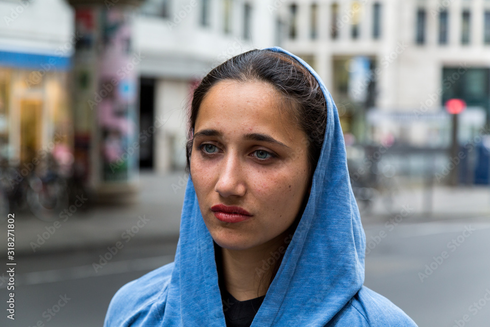 Beautiful Indian Woman with Blue Hood Covering Head Beautiful Indian Woman with Blue Hood Covering Head