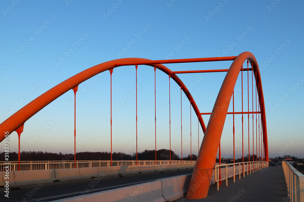 Rzeszow, Poland - 9 9 2018: Suspended road bridge across the autobahn. Metal construction technological structure. Modern architecture