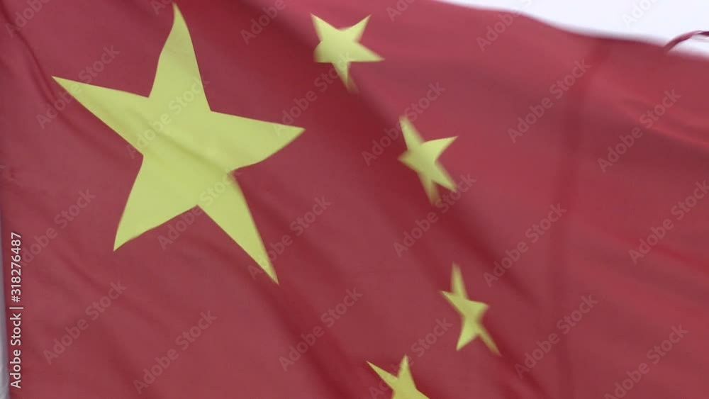 Chinese flag waving in the wind Chinese flag waving in the wind