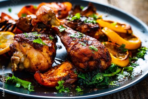 Barbecue chicken drumsticks with roast vegetables