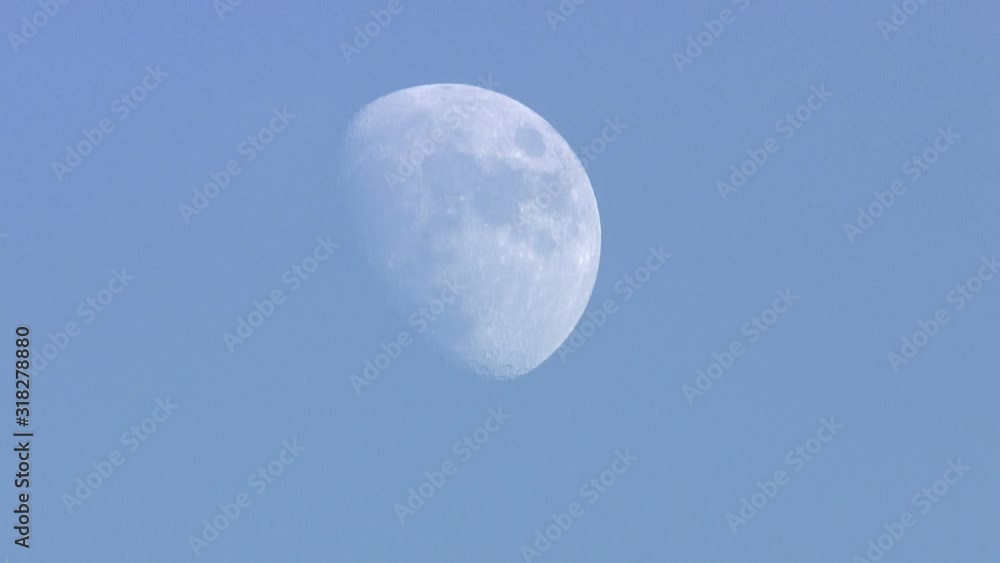 Timelapse of the moon with blue sky Timelapse of the moon with blue sky