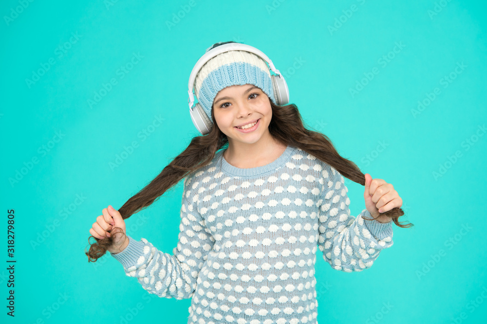 Good vibes. Winter playlist. Entertain herself. Recording studio. Beautiful voice. Developing voice. Small girl long hair listen music headphones. Hobby concept. Winter holidays. Winter music chart Good vibes. Winter playlist. Entertain herself. Recording studio. Beautiful voice. Developing voice. Small girl long hair listen music headphones. Hobby concept. Winter holidays. Winter music chart
