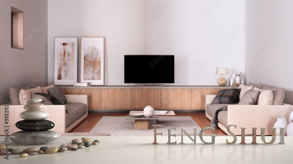 Fototapeta premium White table shelf with pebble balance over cosy dove gray and beige living room with sofa and pillows, lounge, carpet, coffee table, pouf and decors, zen concept interior design