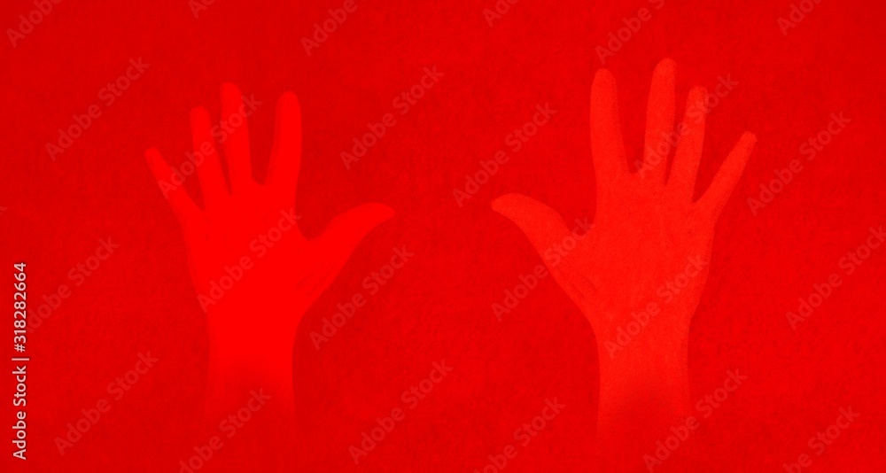Obraz premium red hands on red backgriund 