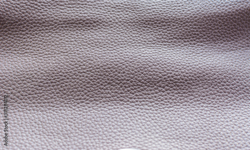 leather background natural animal skin with texture. light purple
