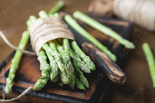Fresh asparagus on a wooden table