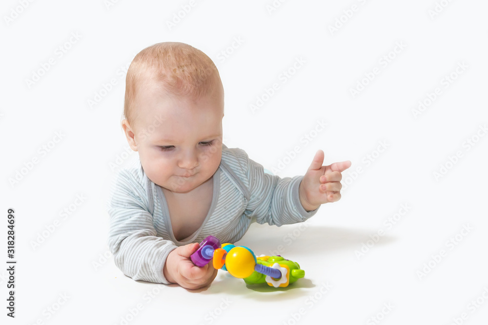 Baby boy is playing with toy showing Baby boy is playing with toy showing