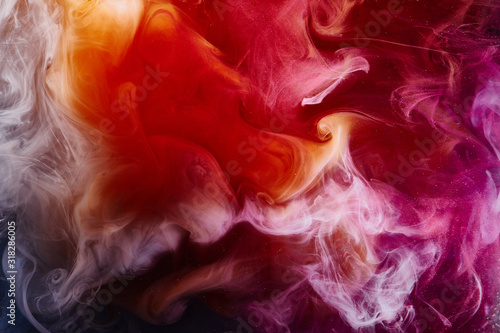 Abstract bright swirling smoke, valentines day background. Vibrant colorful fog, exciting perfume fragrance, hookah backdrop. Contrasting colors of love, passion, sensual sex photo