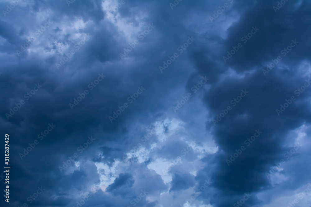 Dramatic cloudscape sky background with dark blue clouds, storm