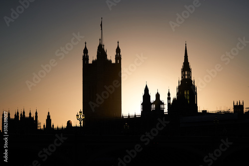 Silhouette of Westminster abbey in London, Picture taken in sunny evening during the golden hour. One of the most famous world places in London, capital of Great Britain.