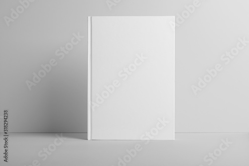 Real photo, blank book, brochure, booklet mockup template, hard cover, isolated on light grey background to place your design. 