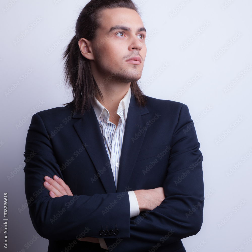 Handsome young elegant man studio portrait. Handsome young elegant man studio portrait.