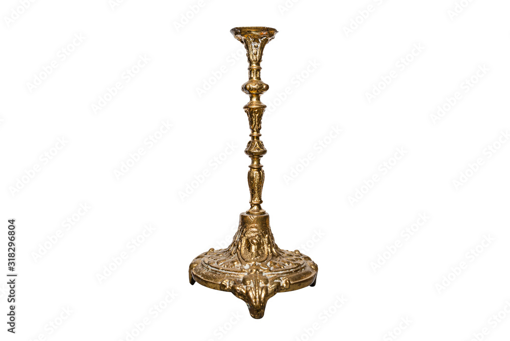 Single arm candlestick made of brass made in old decorative style, isolated on a white background with a clipping path.