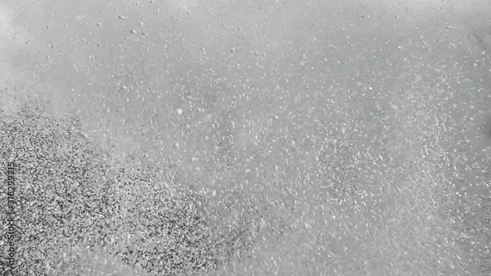 Powerful jet of foam under pressure. Background of splashing white foam. Powerful jet of foam under pressure. Background of splashing white foam.